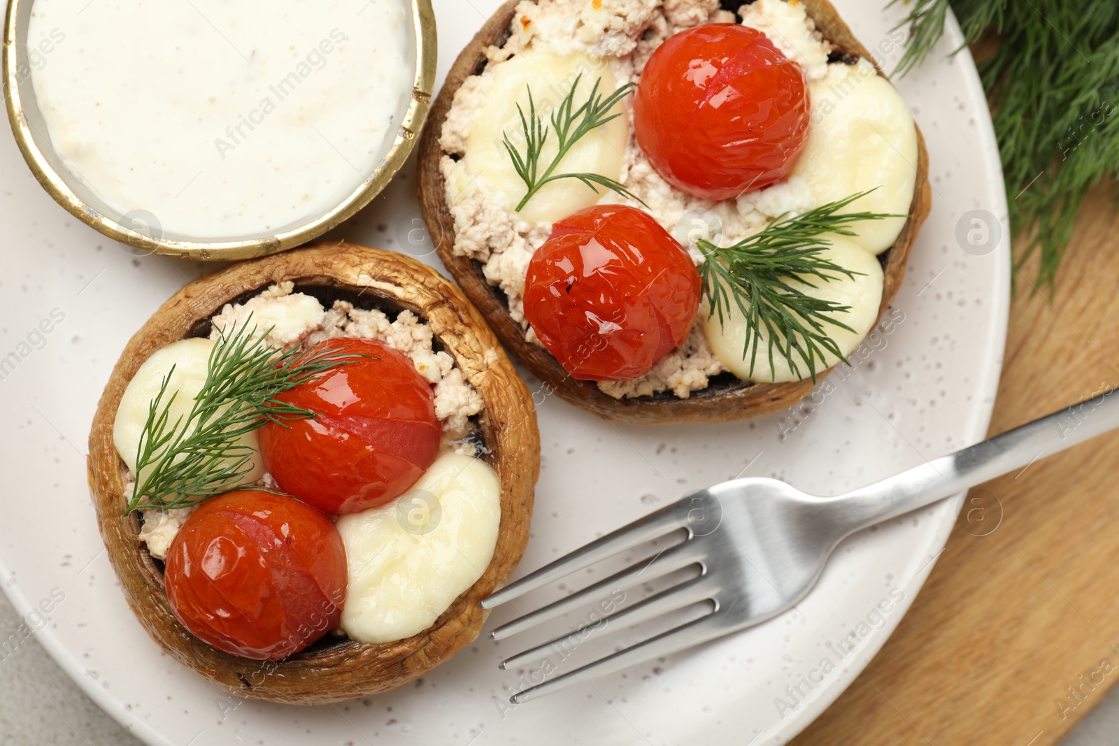 Tasty stuffed mushrooms served on table, top view Photo of Tasty stuffed mushrooms served on table, top view