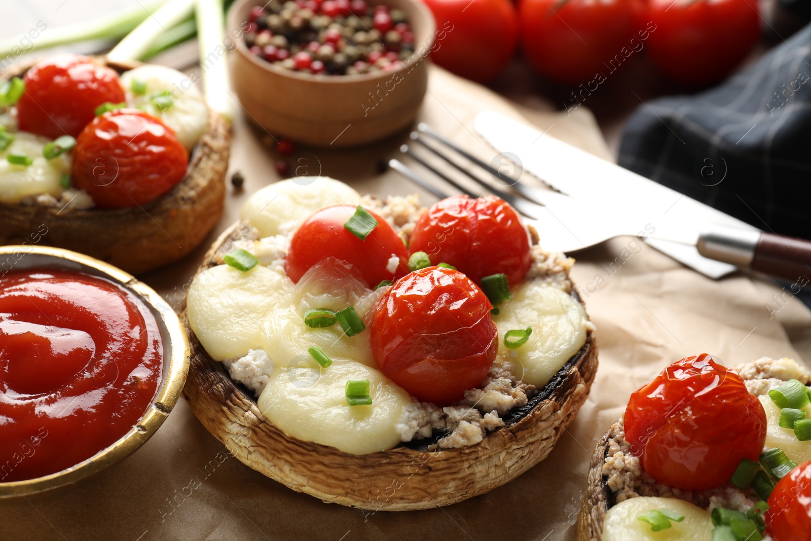 Tasty stuffed mushrooms served on table, closeup Photo of Tasty stuffed mushrooms served on table, closeup