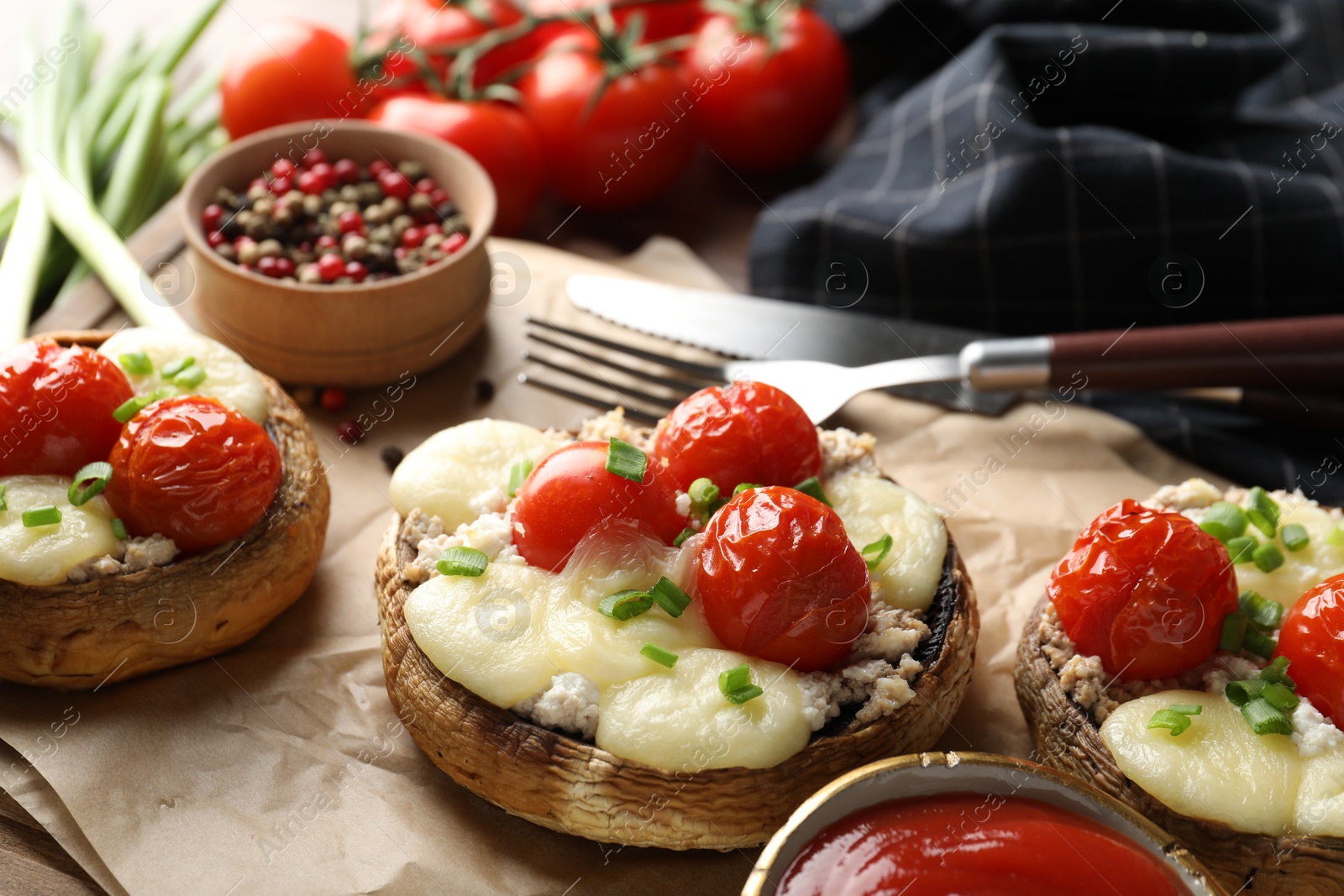 Tasty stuffed mushrooms served on table, closeup Photo of Tasty stuffed mushrooms served on table, closeup
