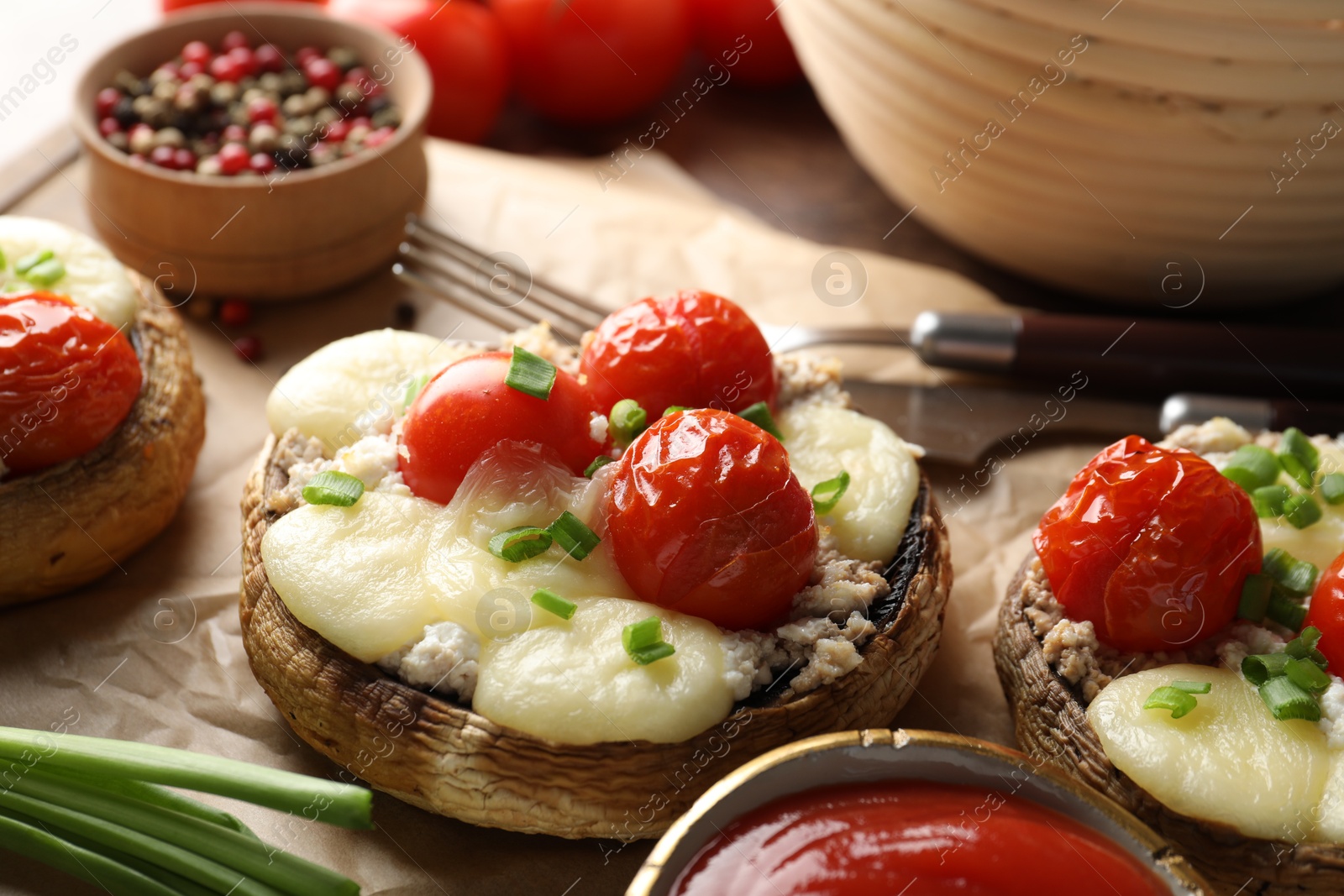 Tasty stuffed mushrooms served on table, closeup Photo of Tasty stuffed mushrooms served on table, closeup