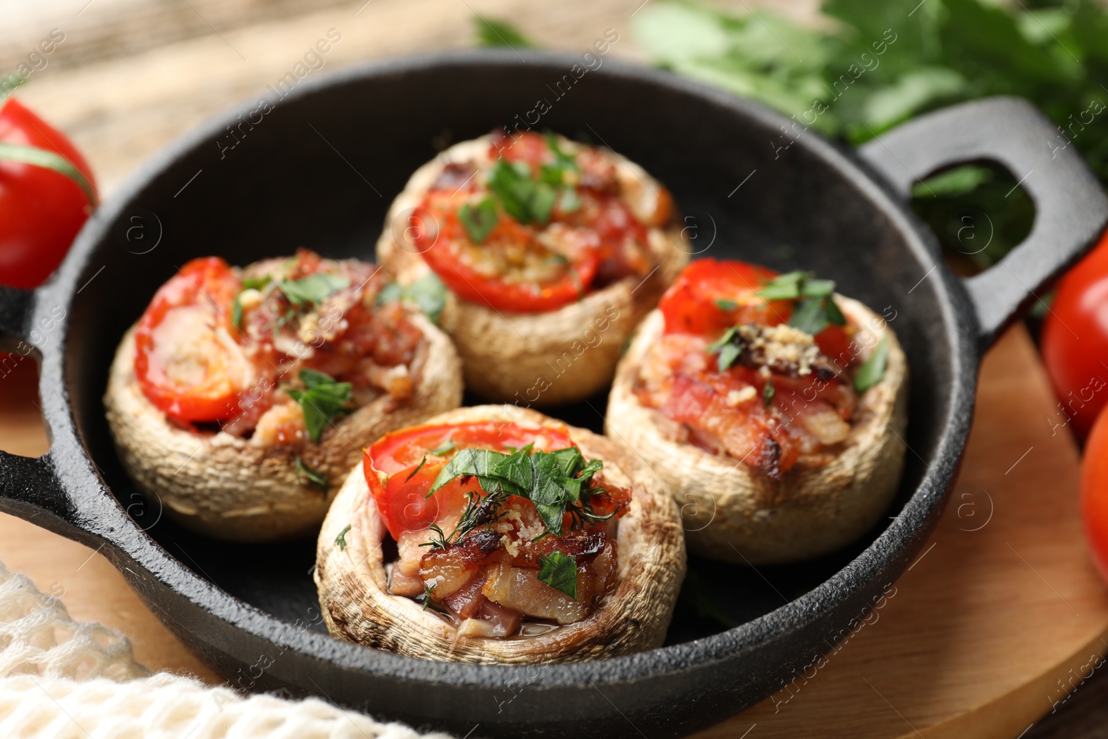 Tasty stuffed mushrooms served on table, closeup Photo of Tasty stuffed mushrooms served on table, closeup