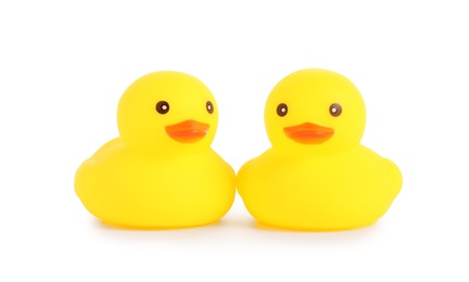 Photo of Cute rubber ducks isolated on white. Children's toy