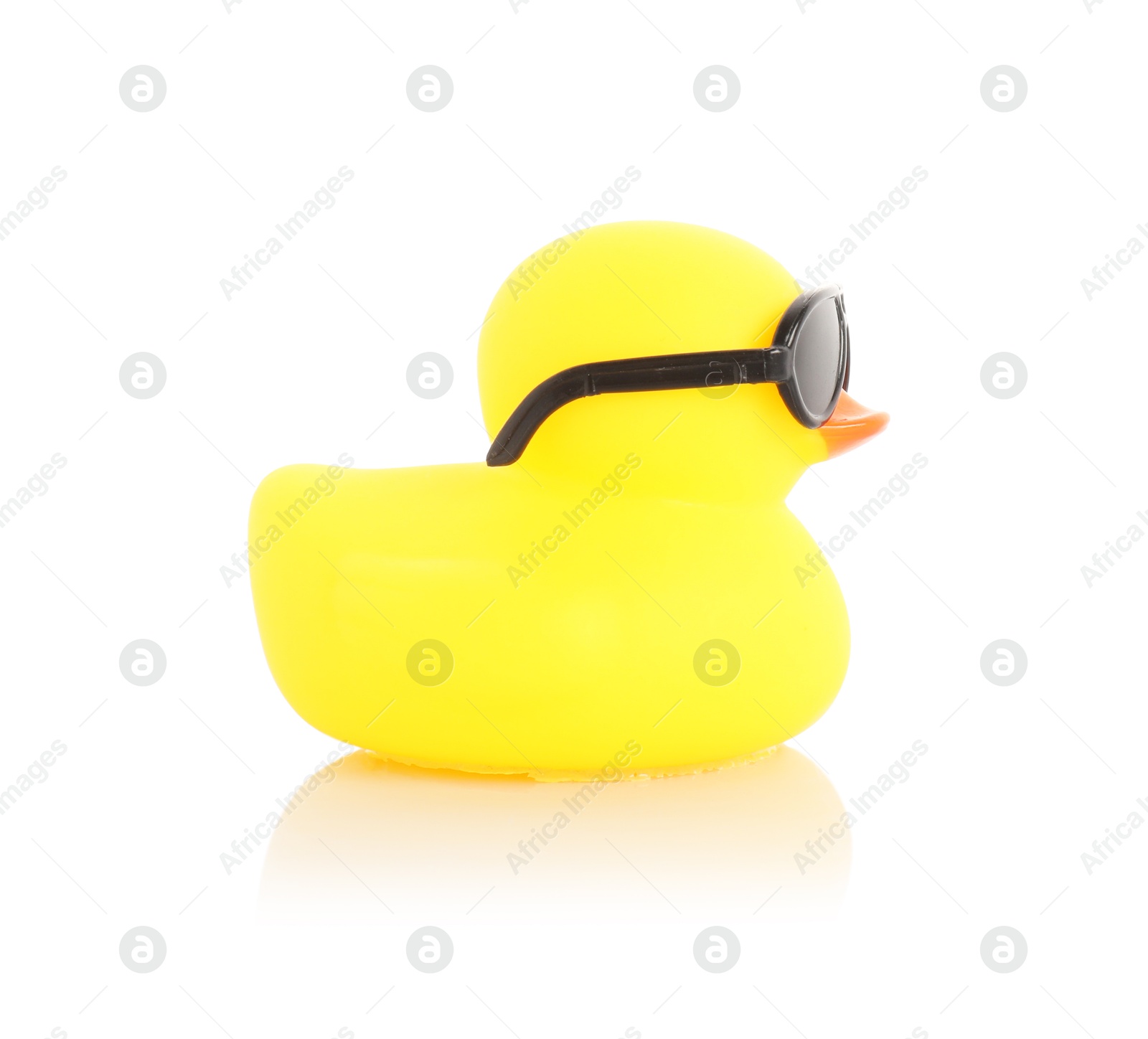 One cute rubber duck in sunglasses on mirror surface against white background Photo of One cute rubber duck in sunglasses on mirror surface against white background