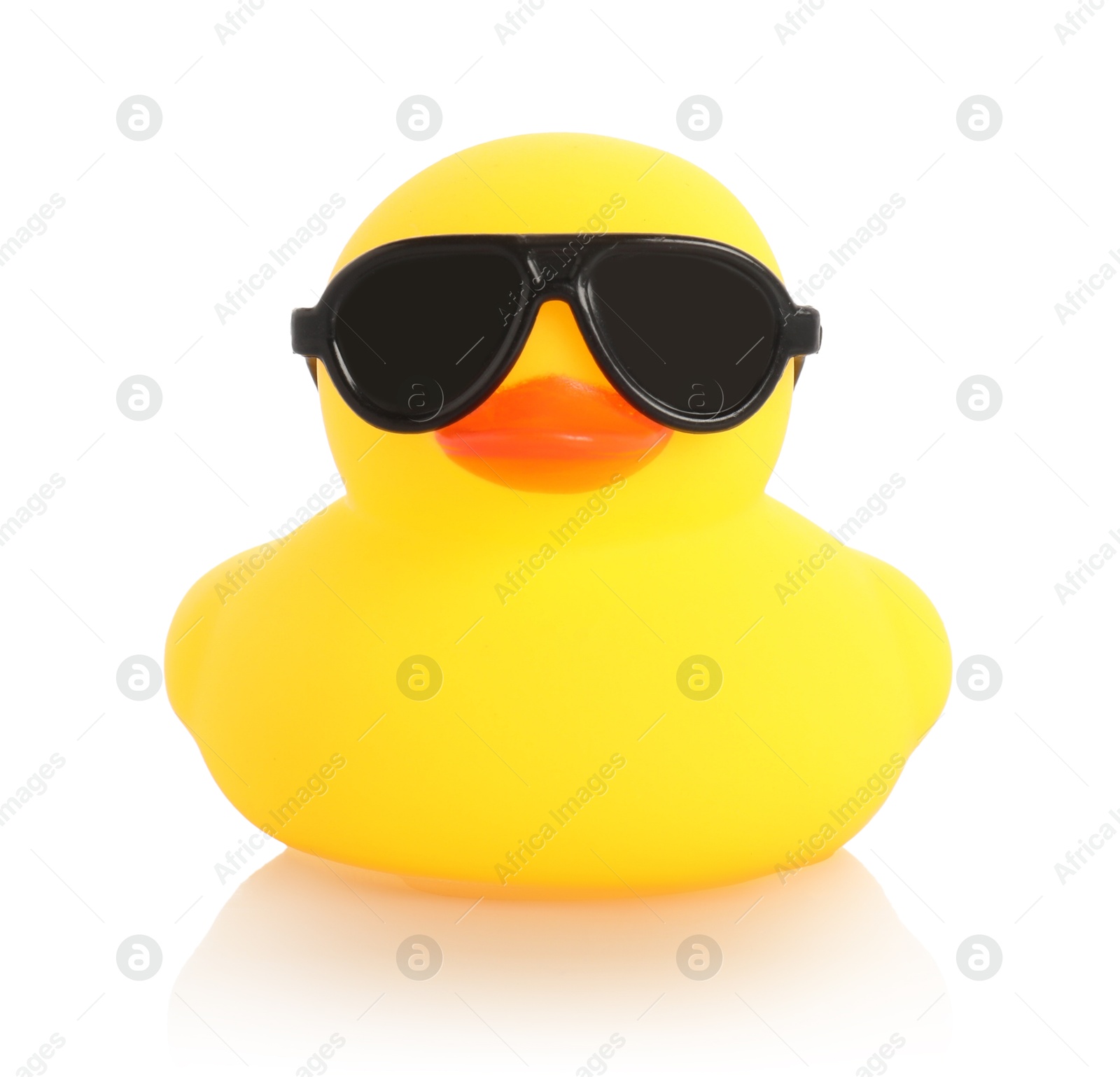 One cute rubber duck in sunglasses on mirror surface against white background Photo of One cute rubber duck in sunglasses on mirror surface against white background