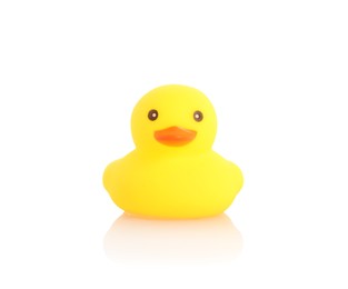 Photo of One cute rubber duck on mirror surface against white background