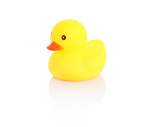 Photo of One cute rubber duck on mirror surface against white background
