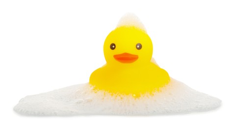 Photo of One cute rubber duck and foam isolated on white