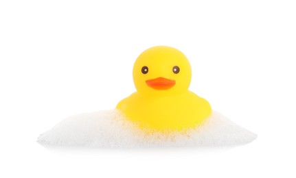 Photo of One cute rubber duck and foam isolated on white
