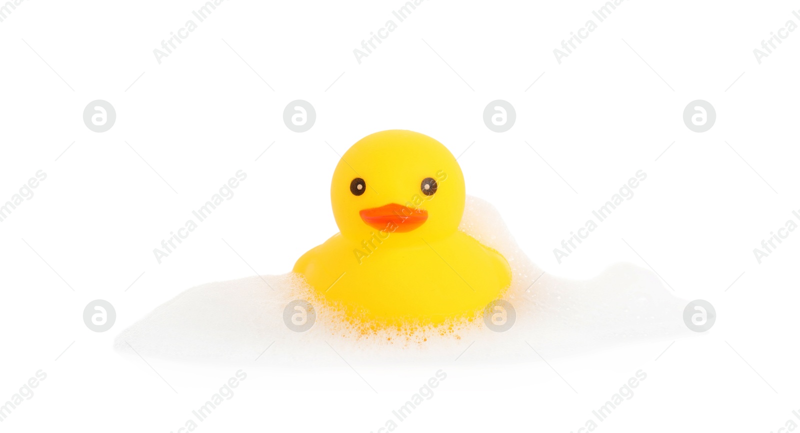 One cute rubber duck and foam isolated on white Photo of One cute rubber duck and foam isolated on white