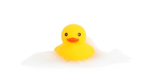 Photo of One cute rubber duck and foam isolated on white