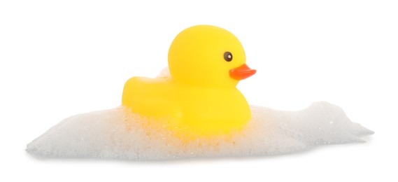 Photo of One cute rubber duck and foam isolated on white