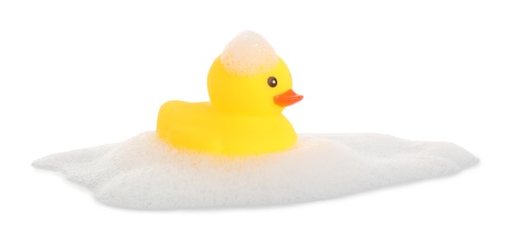 Photo of One cute rubber duck and foam isolated on white