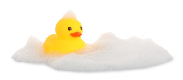 Photo of One cute rubber duck and foam isolated on white