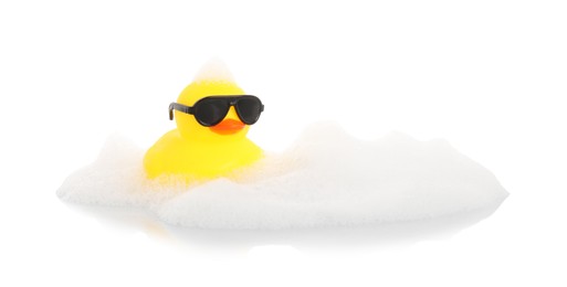 Photo of One cute rubber duck in sunglasses and foam on mirror surface against white background