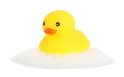 Photo of One cute rubber duck and foam isolated on white