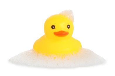 Photo of One cute rubber duck and foam isolated on white