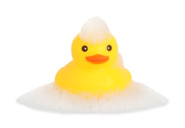 Photo of One cute rubber duck and foam isolated on white