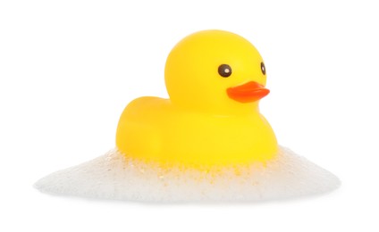 Photo of One cute rubber duck and foam isolated on white