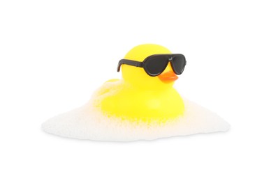 Photo of One cute rubber duck in sunglasses and foam isolated on white