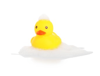 Photo of One cute rubber duck and foam on mirror surface against white background
