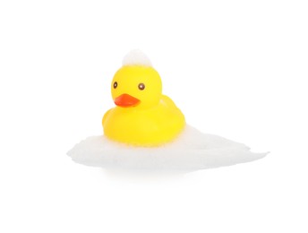 Photo of One cute rubber duck and foam on mirror surface against white background