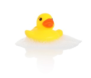 Photo of One cute rubber duck and foam on mirror surface against white background