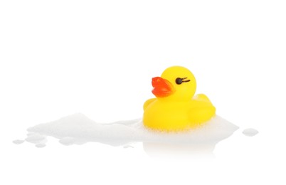 Photo of One cute rubber duck and foam on mirror surface against white background