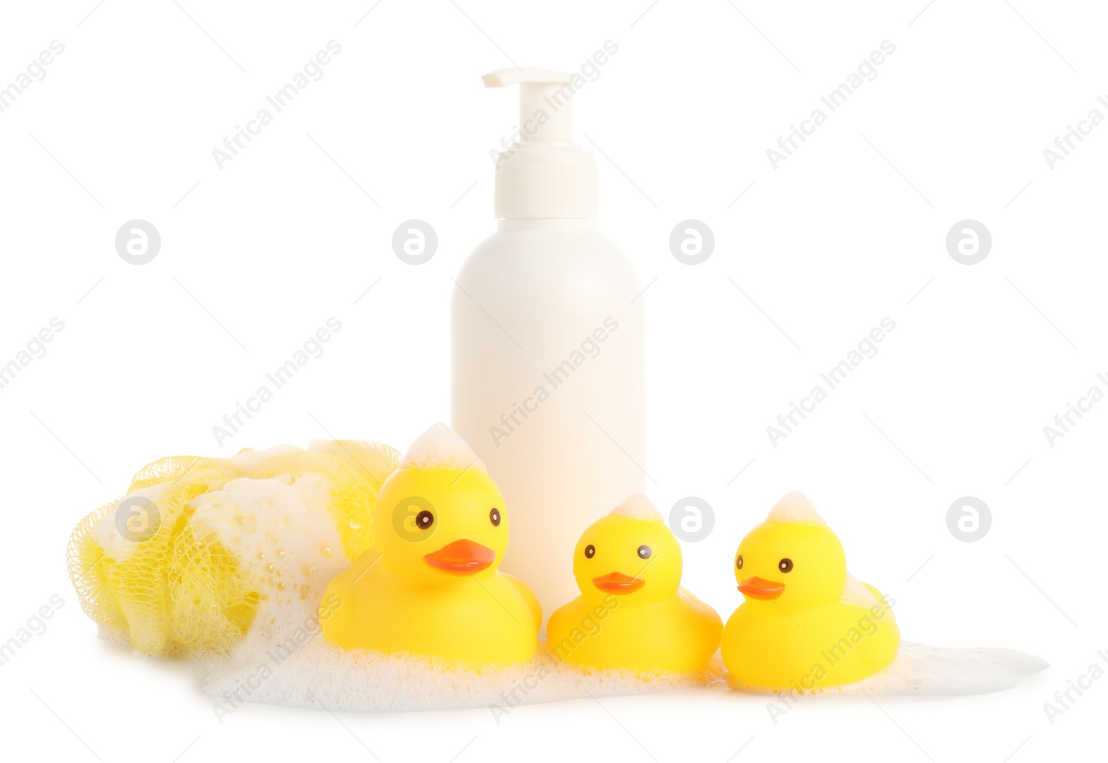 Cute rubber ducks, bottle of bath product, shower puff and foam isolated on white Photo of Cute rubber ducks, bottle of bath product, shower puff and foam isolated on white