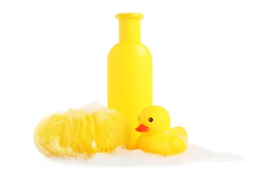 Photo of Cute rubber duck, bottle of bath product, shower puff and foam isolated on white