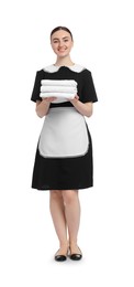 Photo of Chambermaid with stack of clean towels on white background