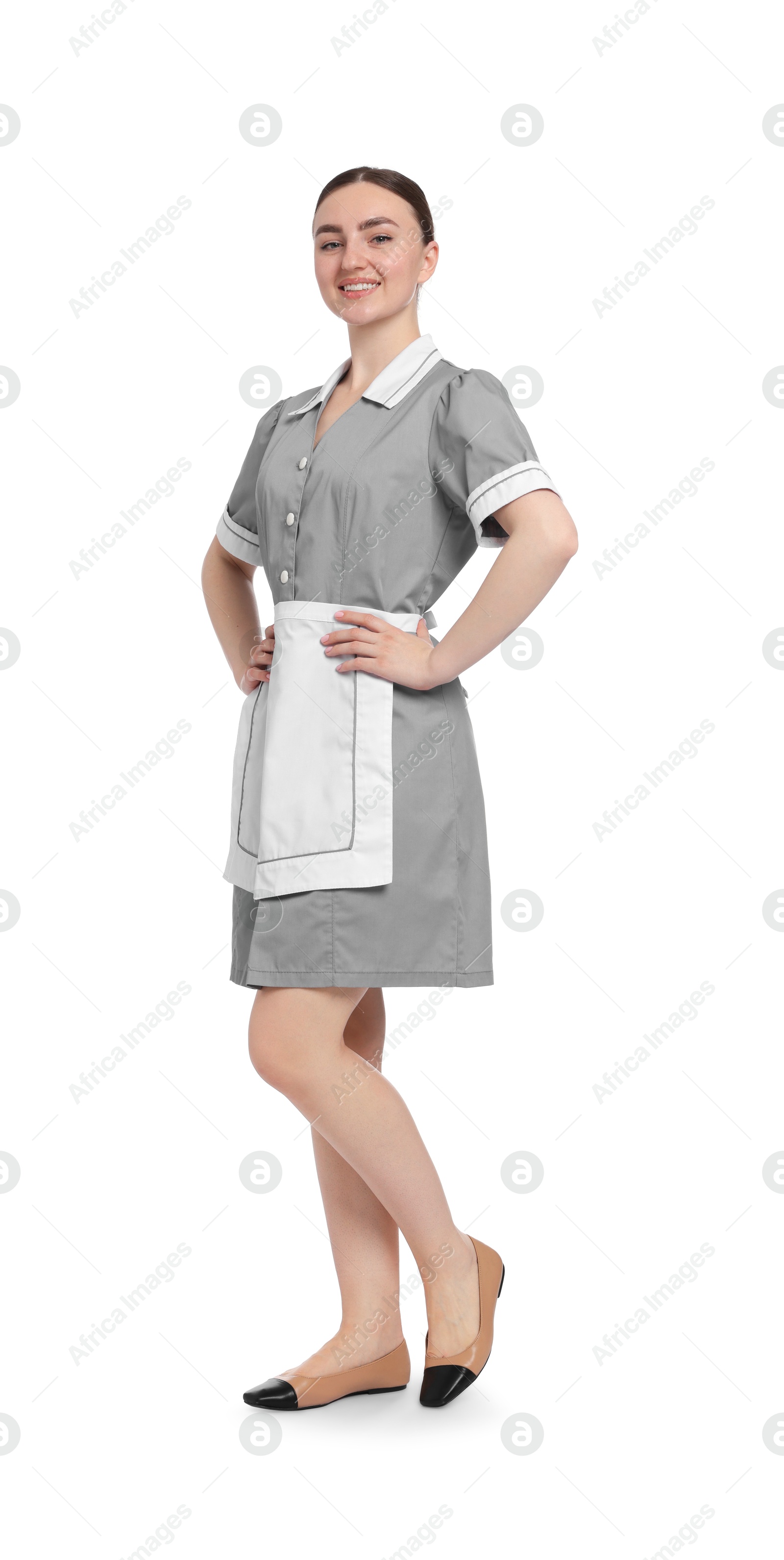 Full-length portrait of happy chambermaid on white background Photo of Full-length portrait of happy chambermaid on white background