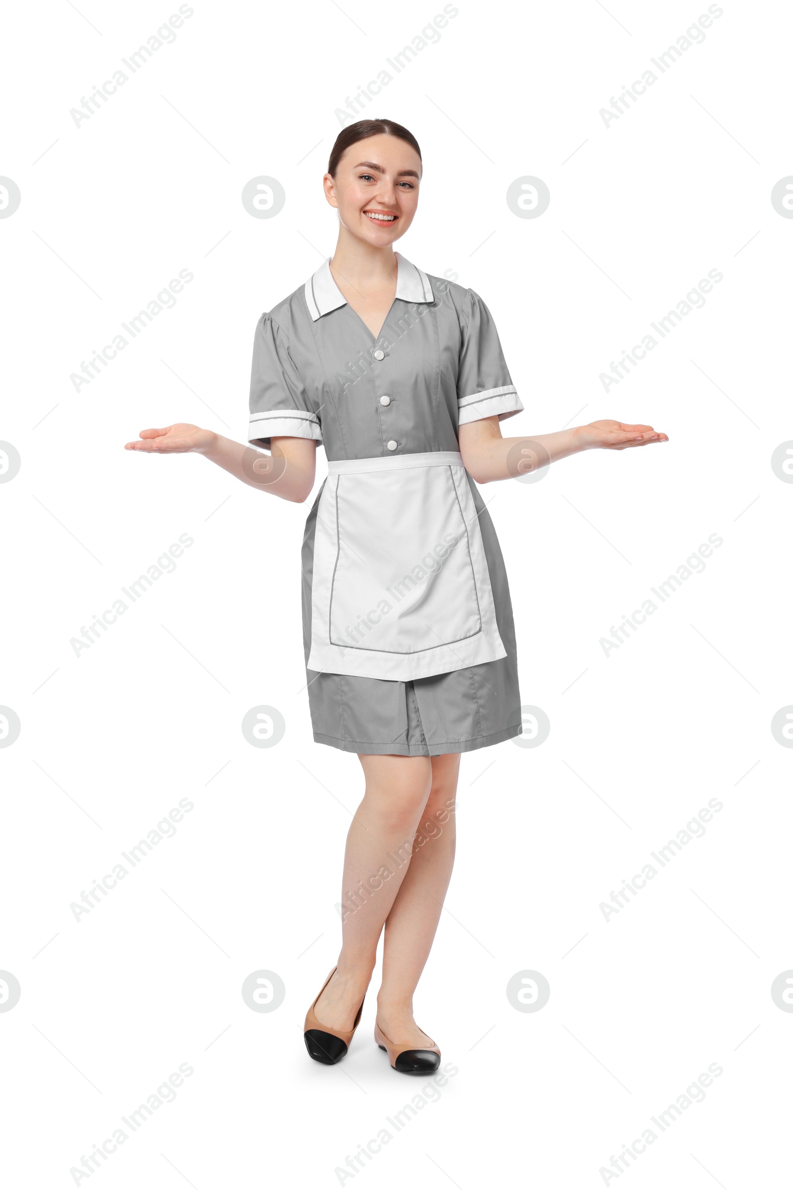 Full-length portrait of happy chambermaid on white background Photo of Full-length portrait of happy chambermaid on white background