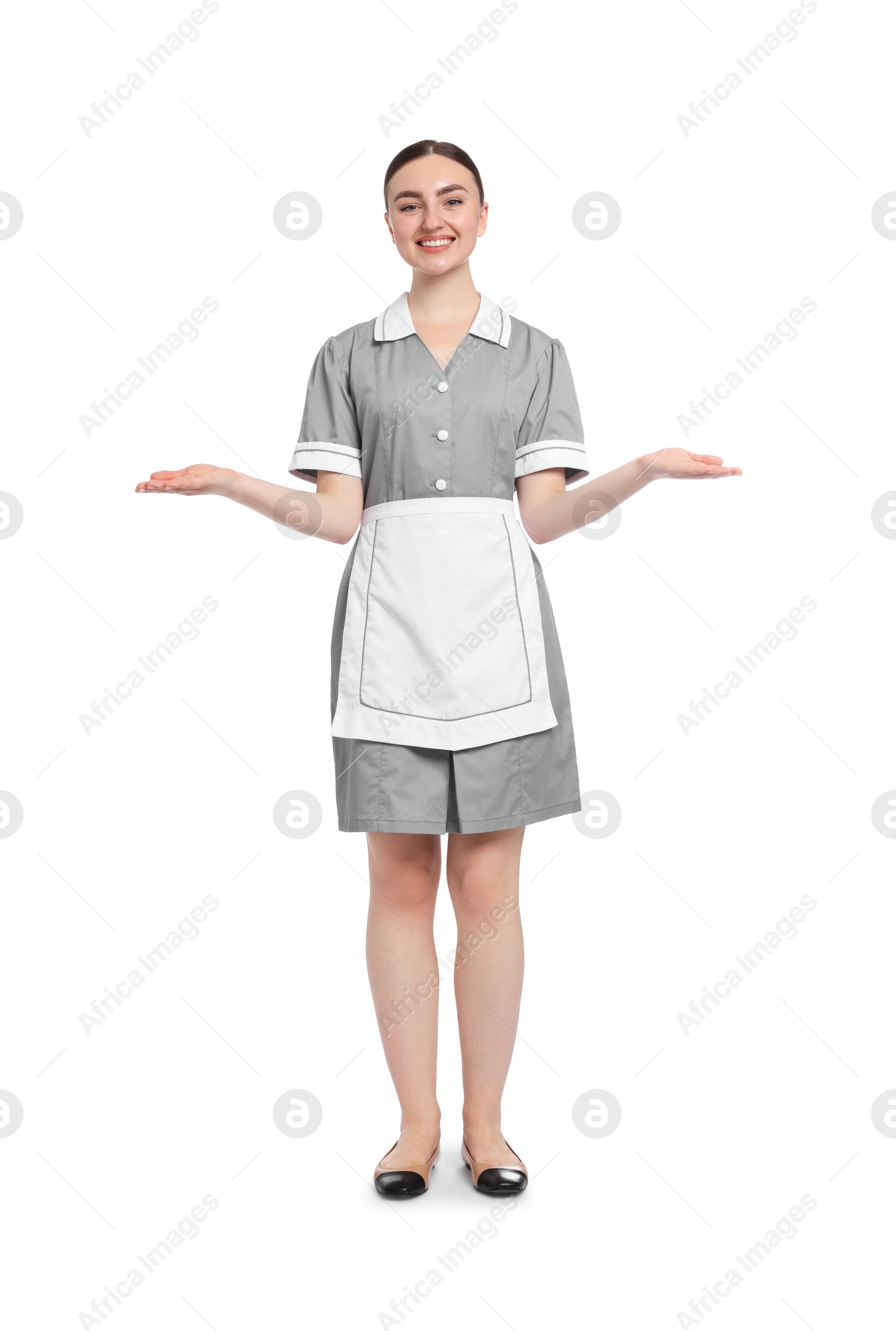 Full-length portrait of happy chambermaid on white background Photo of Full-length portrait of happy chambermaid on white background