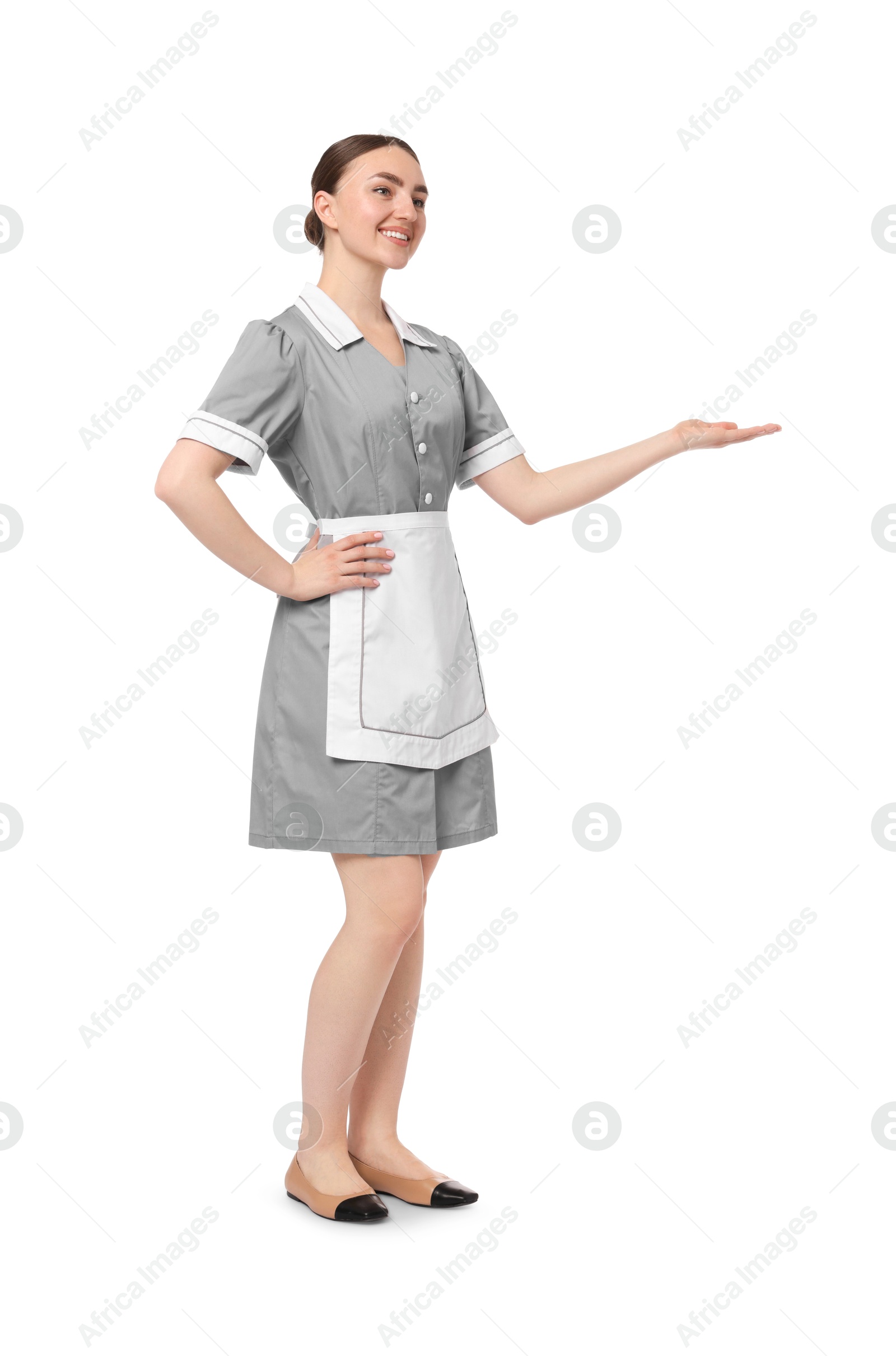Full-length portrait of happy chambermaid on white background Photo of Full-length portrait of happy chambermaid on white background