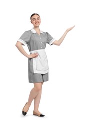 Photo of Full-length portrait of happy chambermaid on white background