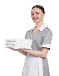 Photo of Chambermaid with stack of clean towels on white background