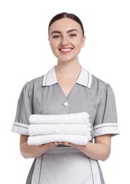 Photo of Chambermaid with stack of clean towels on white background