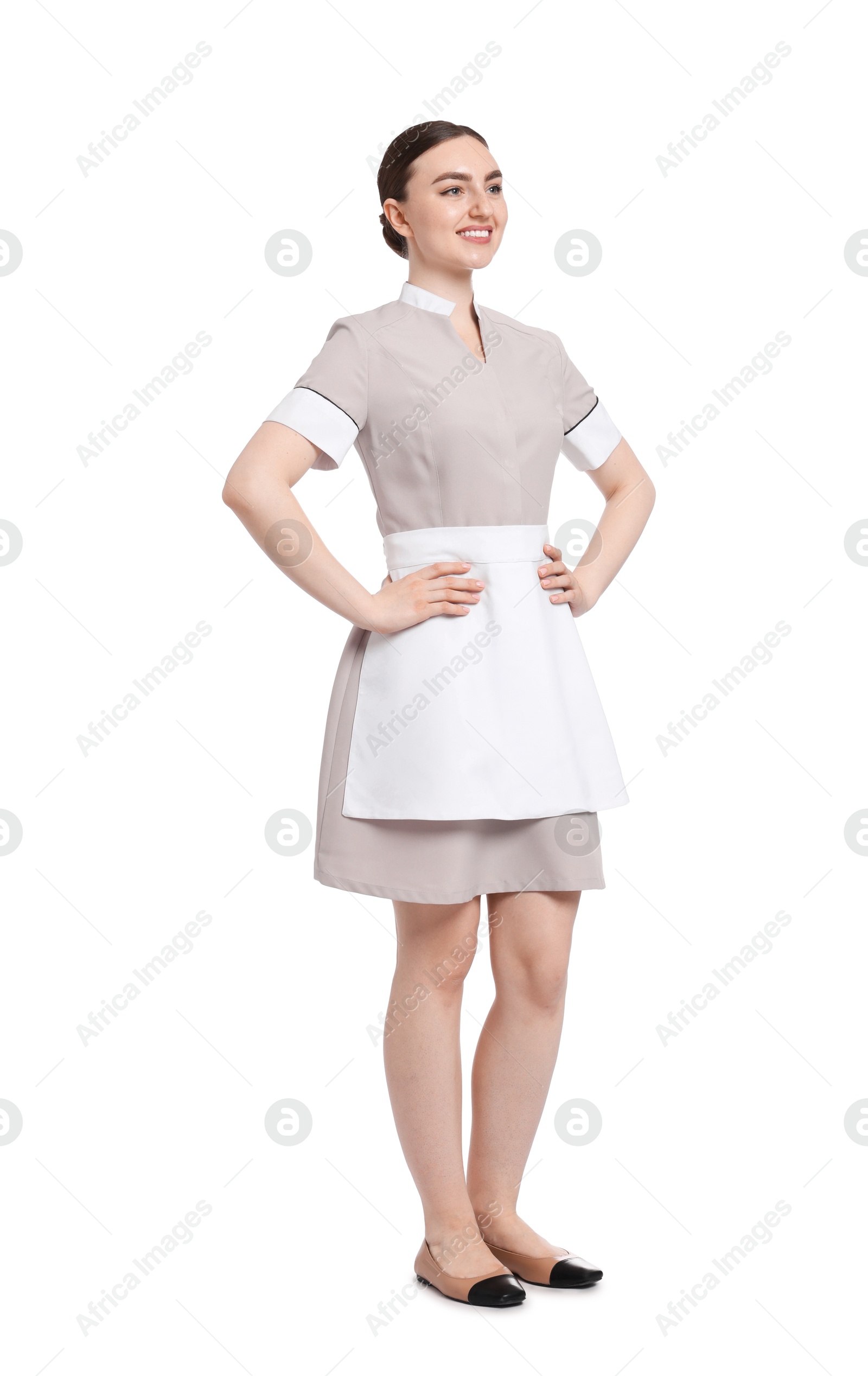 Full-length portrait of happy chambermaid on white background Photo of Full-length portrait of happy chambermaid on white background