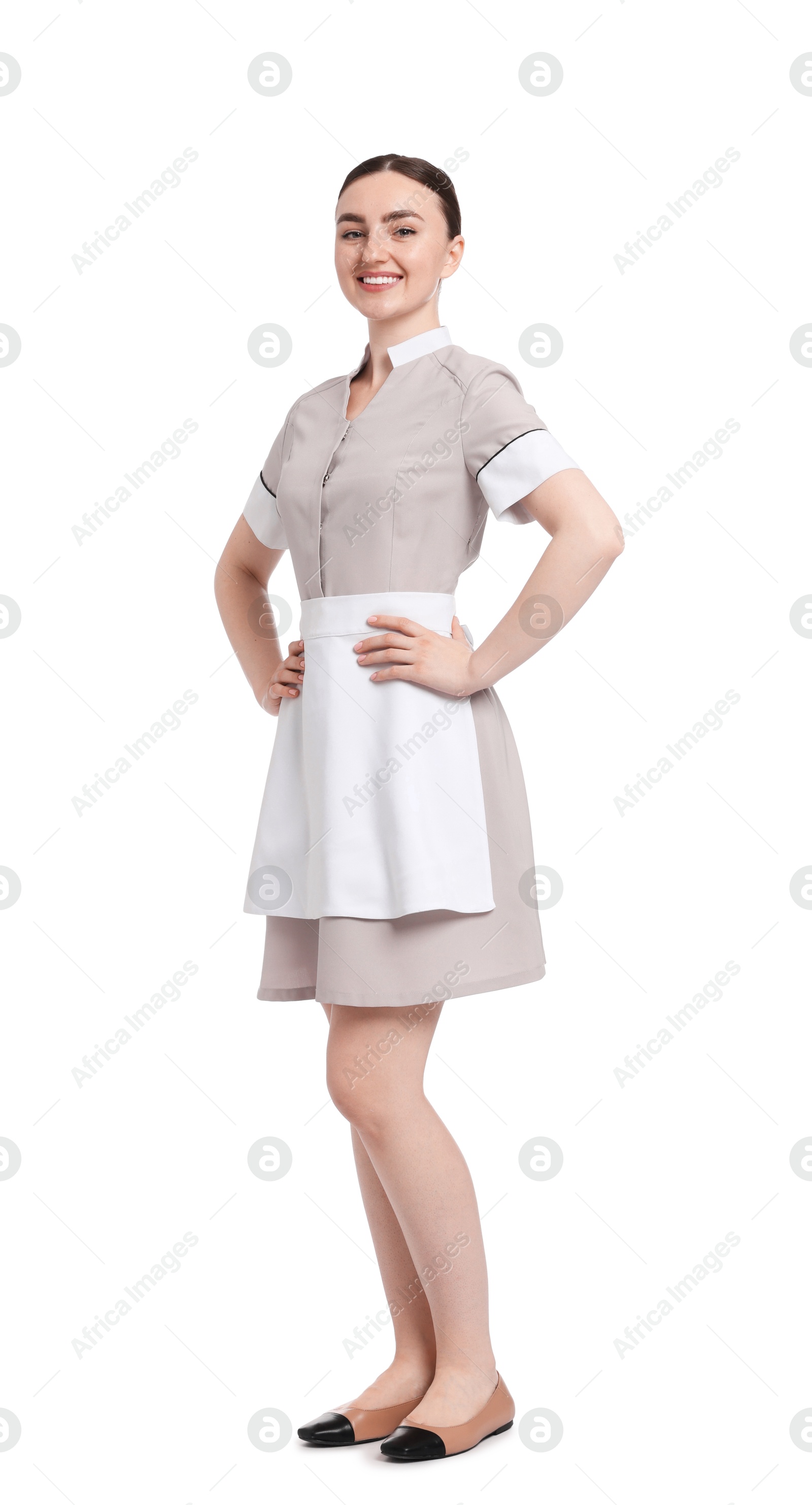 Full-length portrait of happy chambermaid on white background Photo of Full-length portrait of happy chambermaid on white background