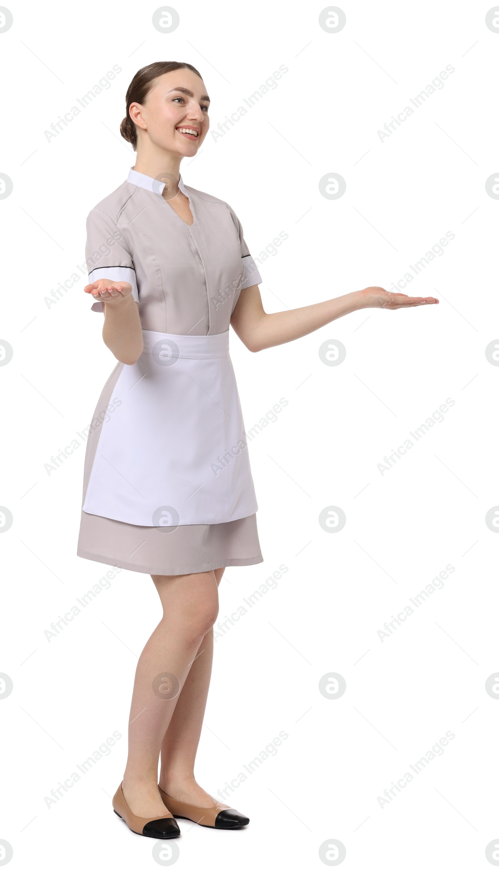 Full-length portrait of happy chambermaid on white background Photo of Full-length portrait of happy chambermaid on white background