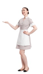 Photo of Full-length portrait of happy chambermaid on white background