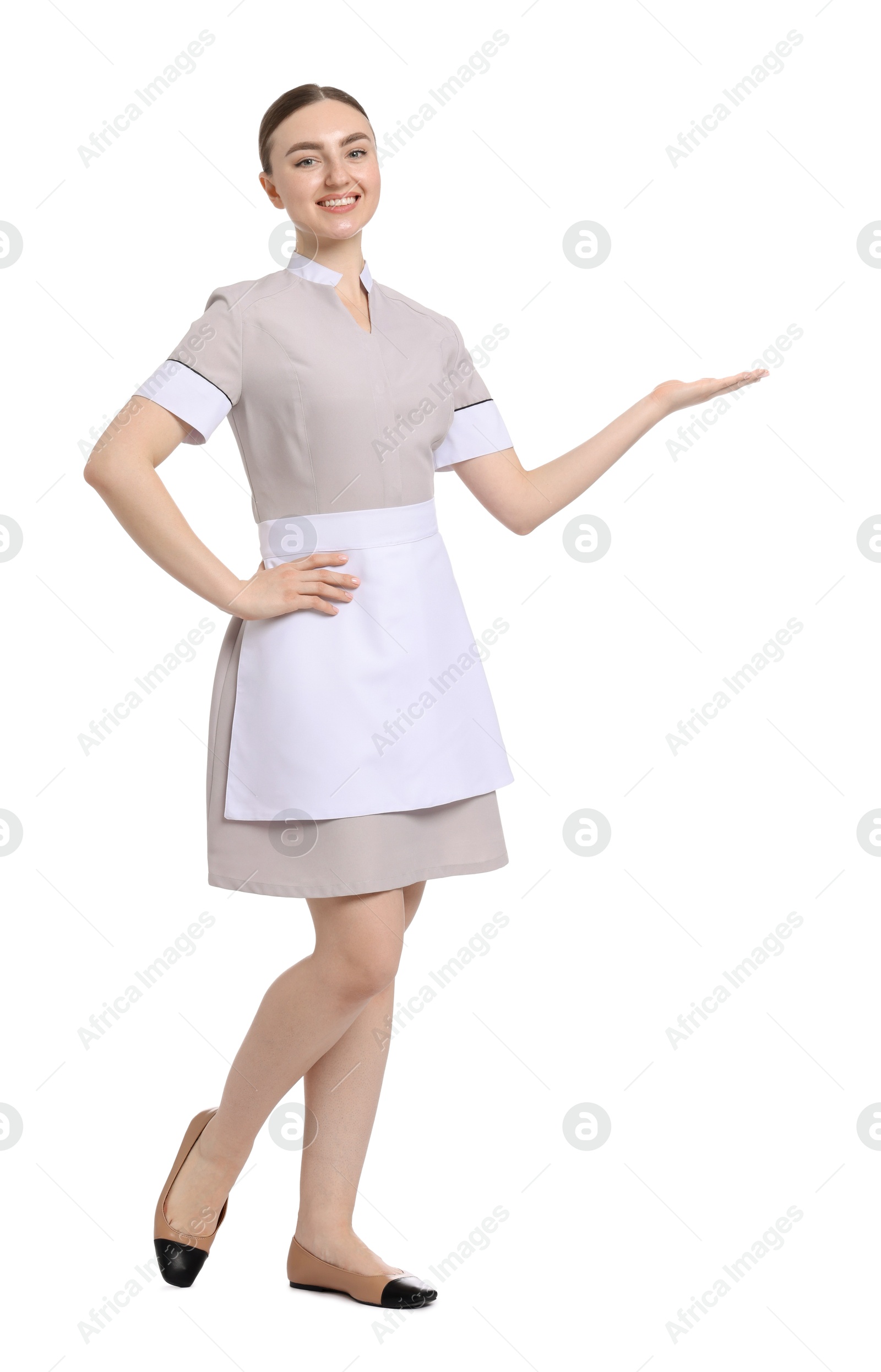 Full-length portrait of happy chambermaid on white background Photo of Full-length portrait of happy chambermaid on white background