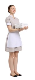 Photo of Chambermaid with stack of clean towels on white background