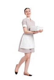 Photo of Chambermaid with stack of clean towels on white background