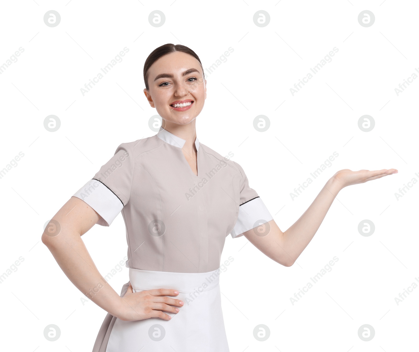 Portrait of happy chambermaid on white background Photo of Portrait of happy chambermaid on white background