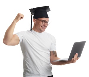 Photo of Happy student with laptop after graduation on white background