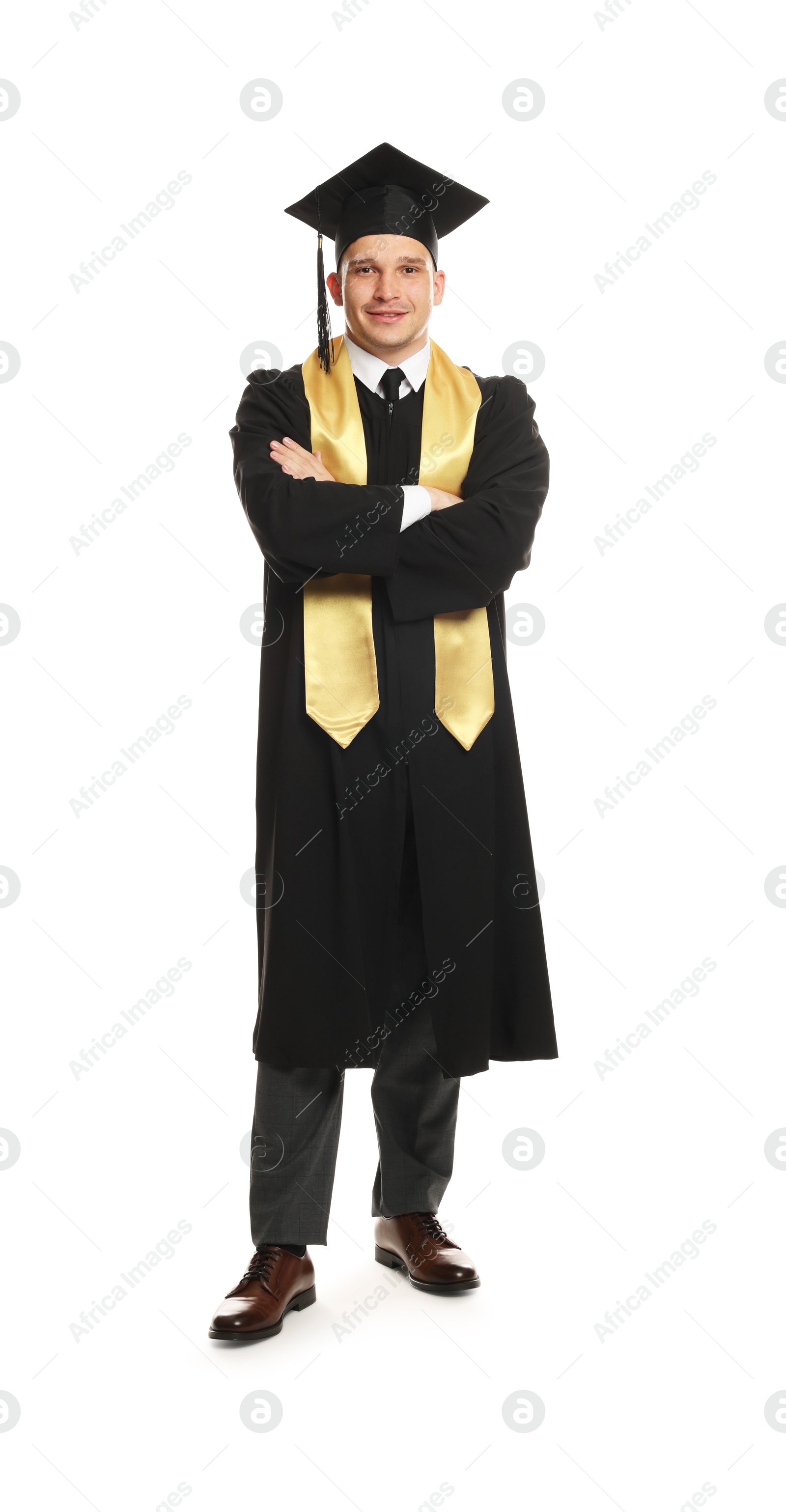 Happy student after graduation on white background Photo of Happy student after graduation on white background