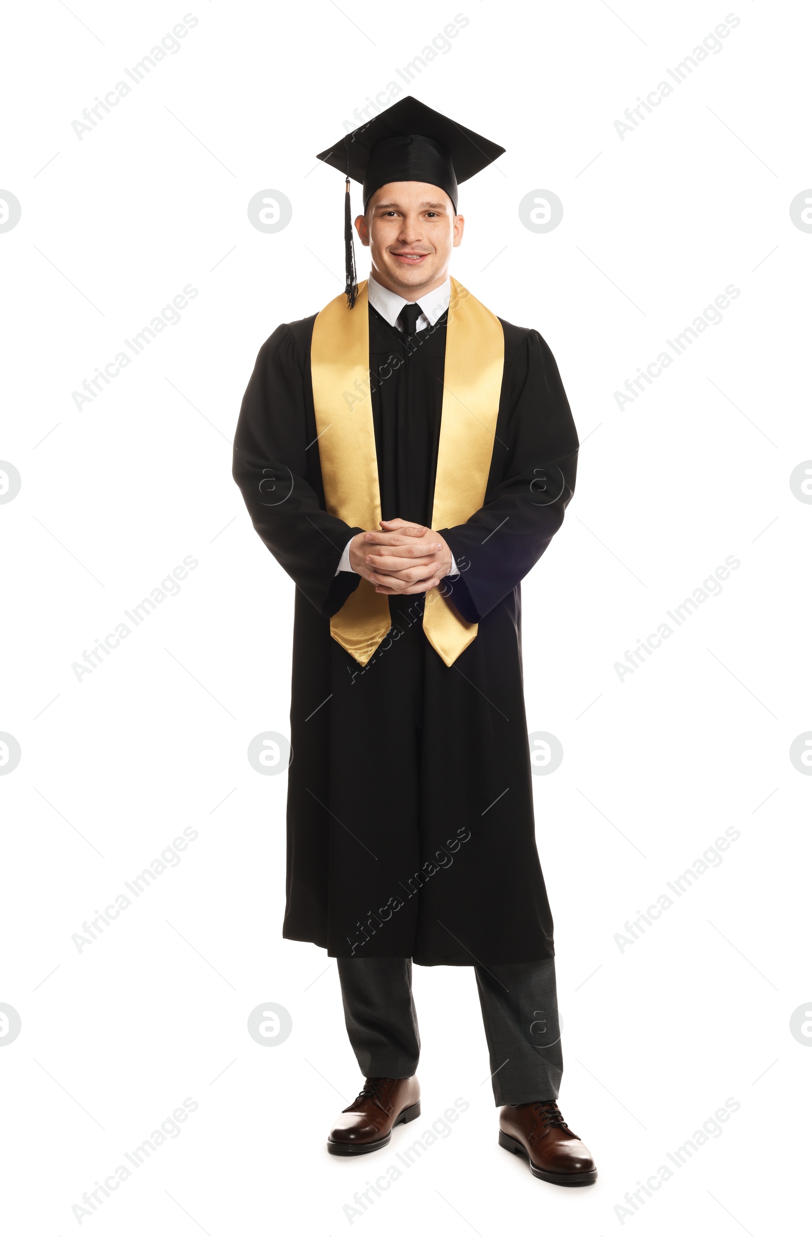 Happy student after graduation on white background Photo of Happy student after graduation on white background