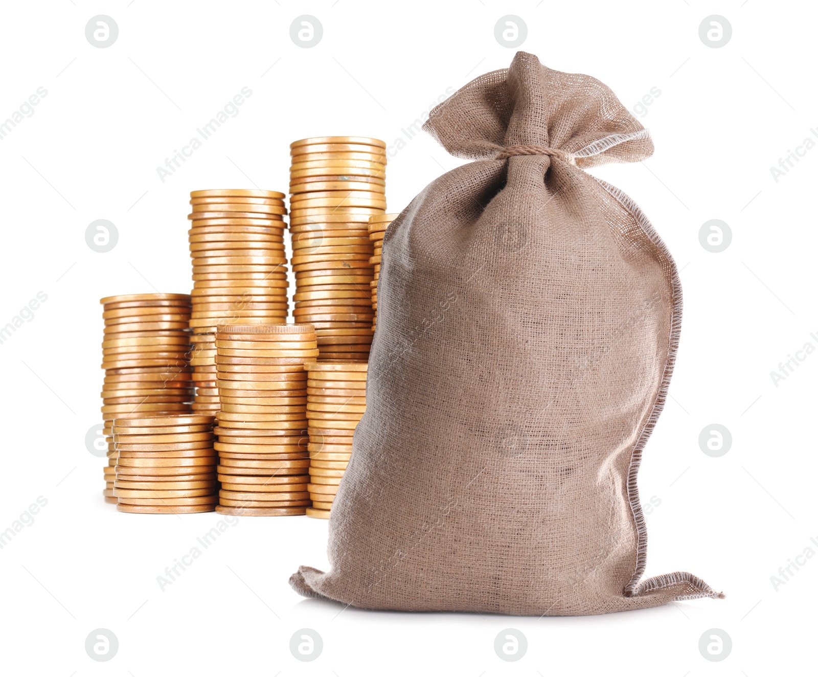 Wealth. Stacked coins and burlap bag isolated on white Image of Wealth. Stacked coins and burlap bag isolated on white