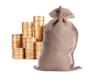 Image of Wealth. Stacked coins and burlap bag isolated on white